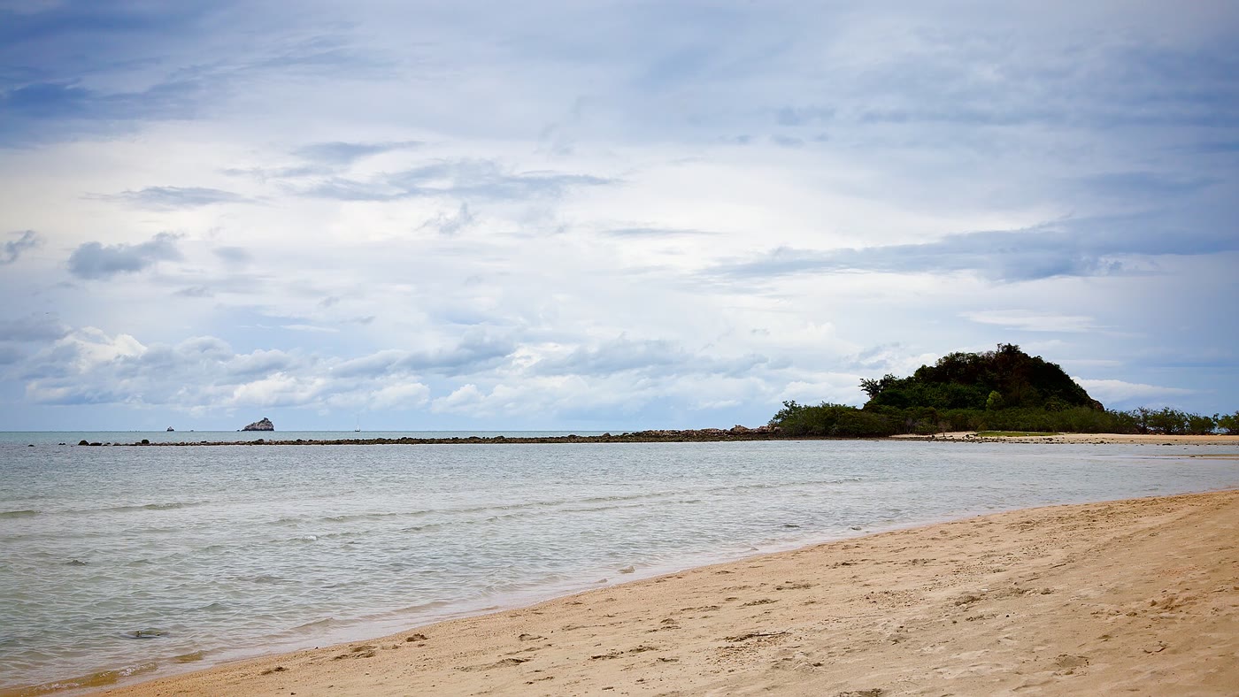 Choeng Mon Beach, Koh Samui, a sheltered bay with long-tail boats at the water's edge