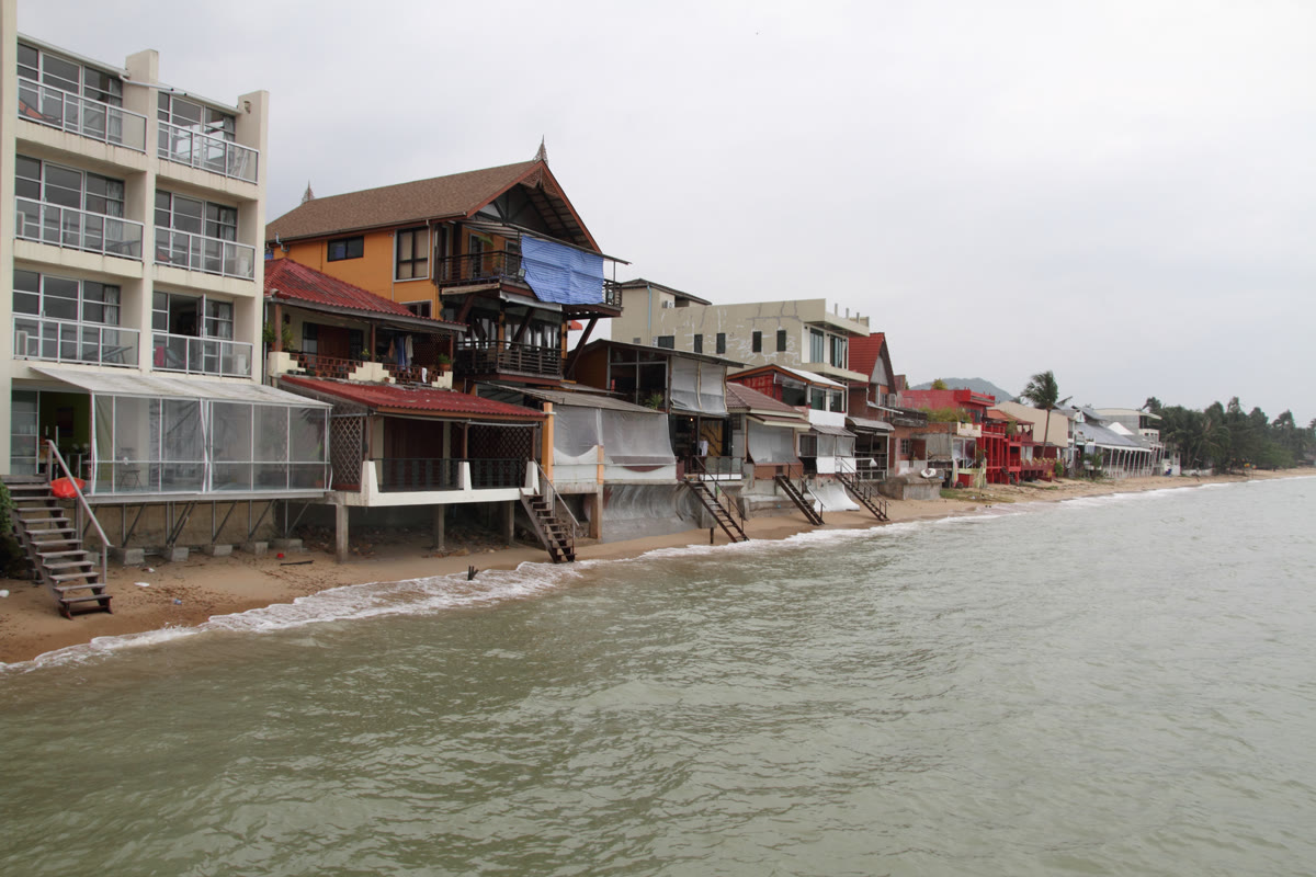 Fisherman's Village in Bophut by day, a row of wooden shophouses on the street that becomes the Friday walking street