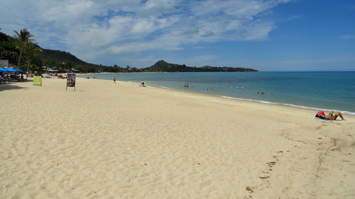 South Lamai Beach with umbrellas and granite