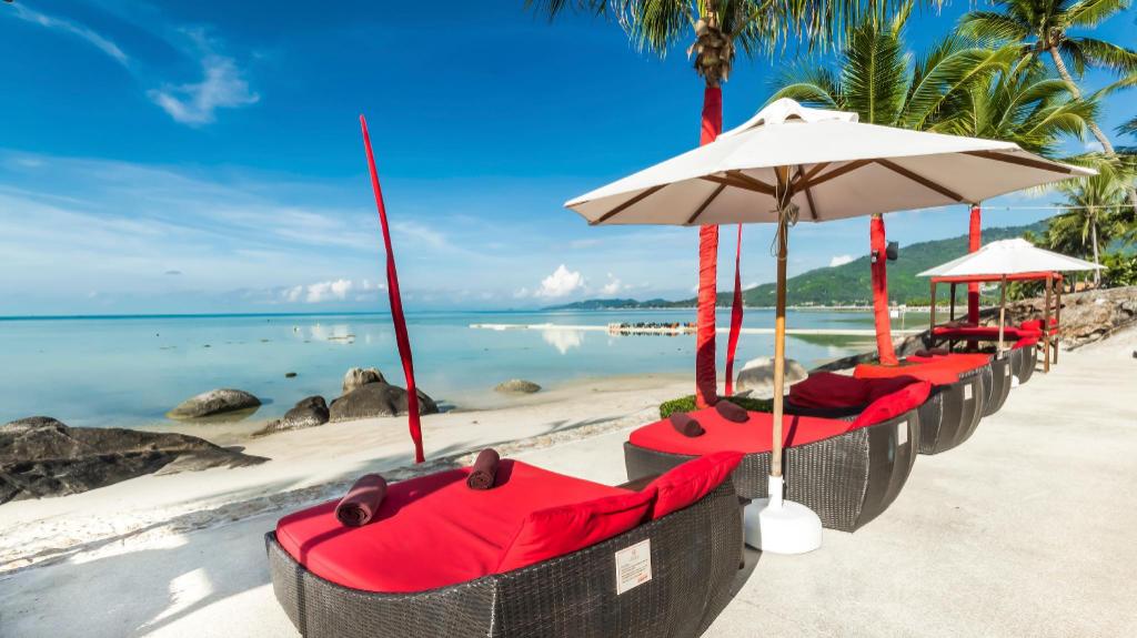 View from a Beach Republic deck across the pool to the Gulf of Thailand and a distant island