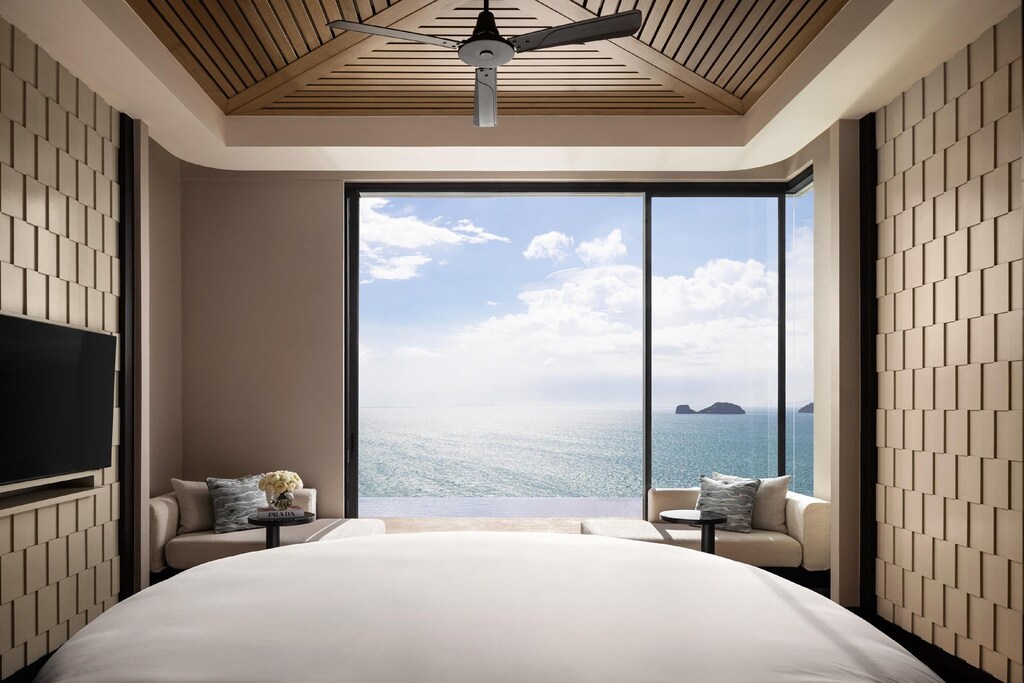 Conrad Koh Samui villa bedroom with two beds and a balcony