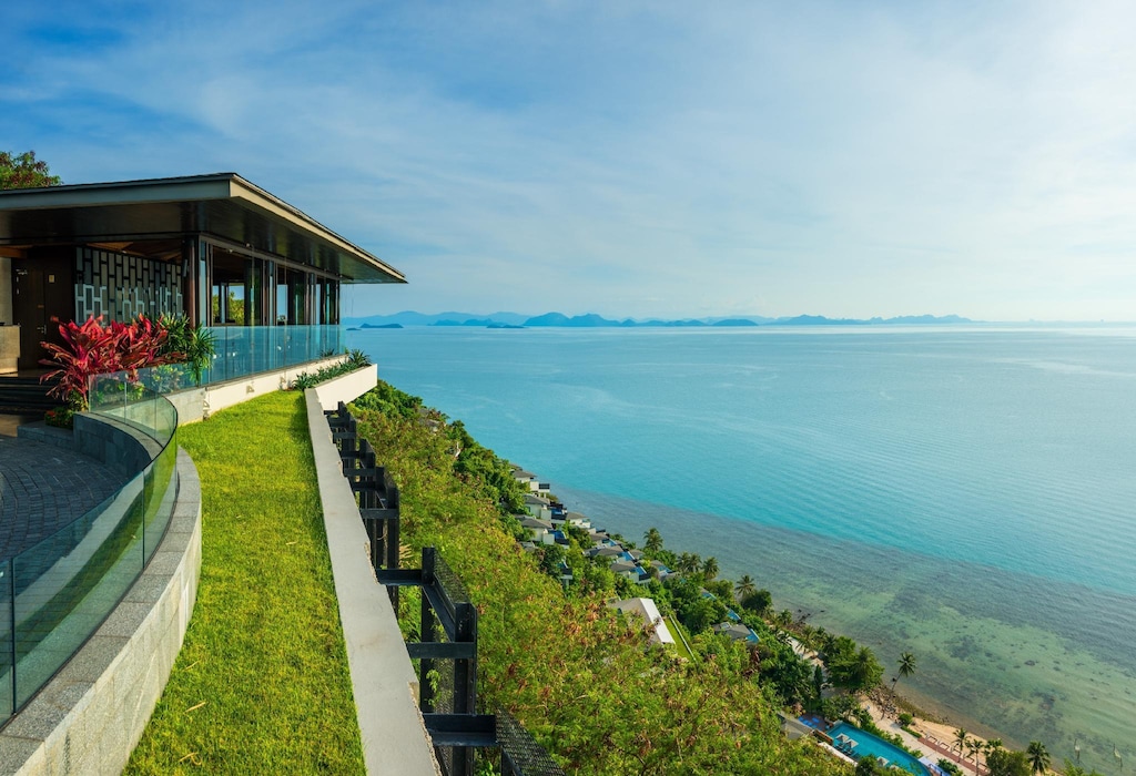 Conrad Koh Samui lobby and reception, with the resort name on the wall